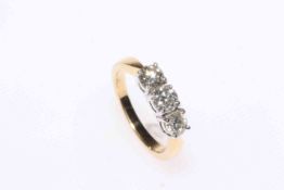 18 carat gold three stone diamond ring, approximate total diamond weight 1.25 carat, size M.