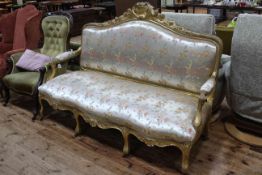 Antique giltwood arched back settee with serpentine front seat, 120cm by 176cm.
