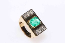 18 carat gold, Columbian emerald and diamond ring, having 1.5 carat emerald, size H.