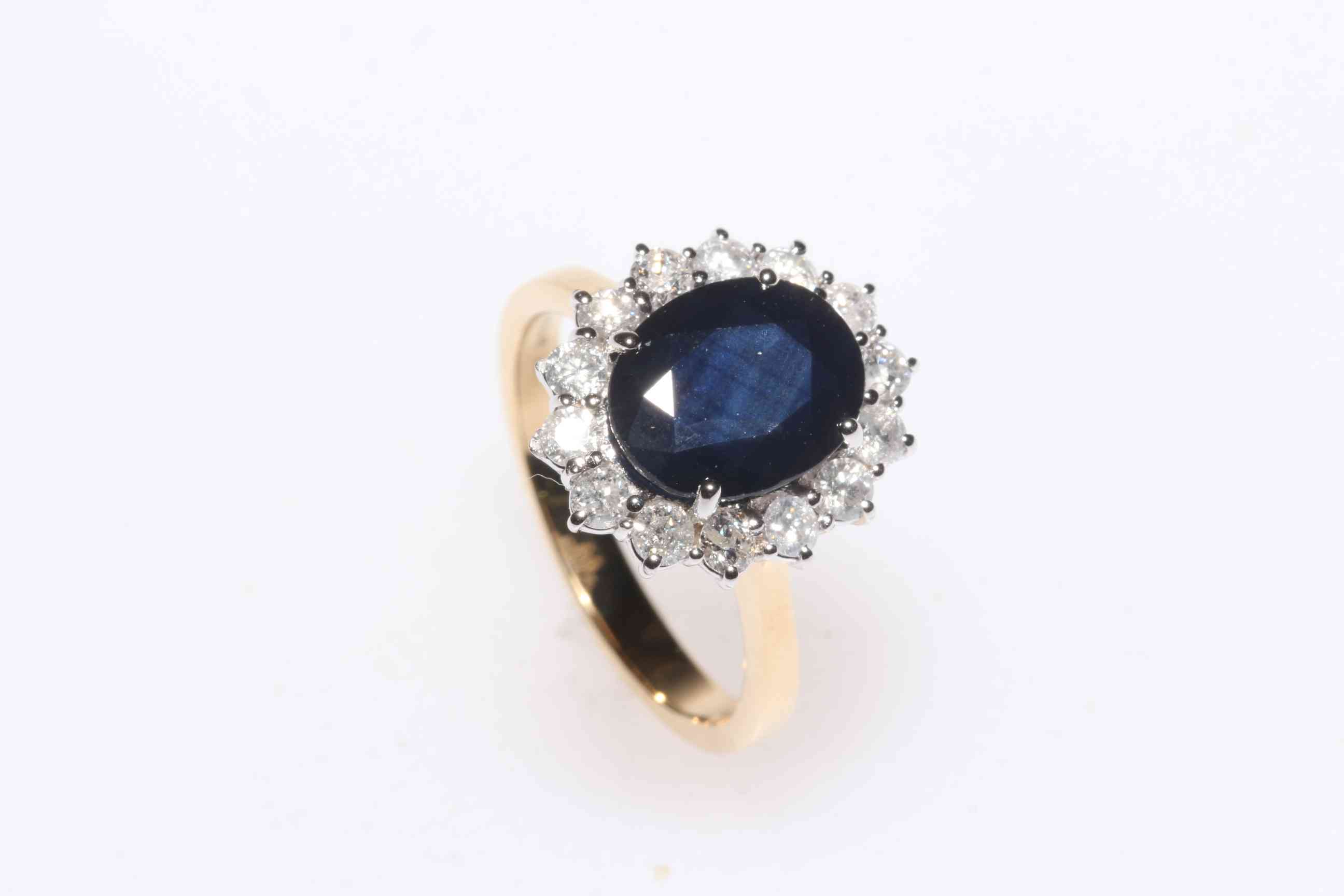Sapphire and diamond 18 carat gold cluster ring,