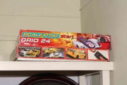 Scalextric Grid 24 and a Scalextric Euro Champions racing car sets.