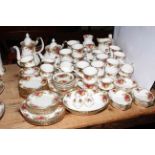 Large collection of Royal Albert Country Roses over 110 pieces, including coffee and teapots,