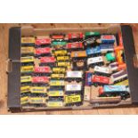 Box of model railway advertising rolling stock.
