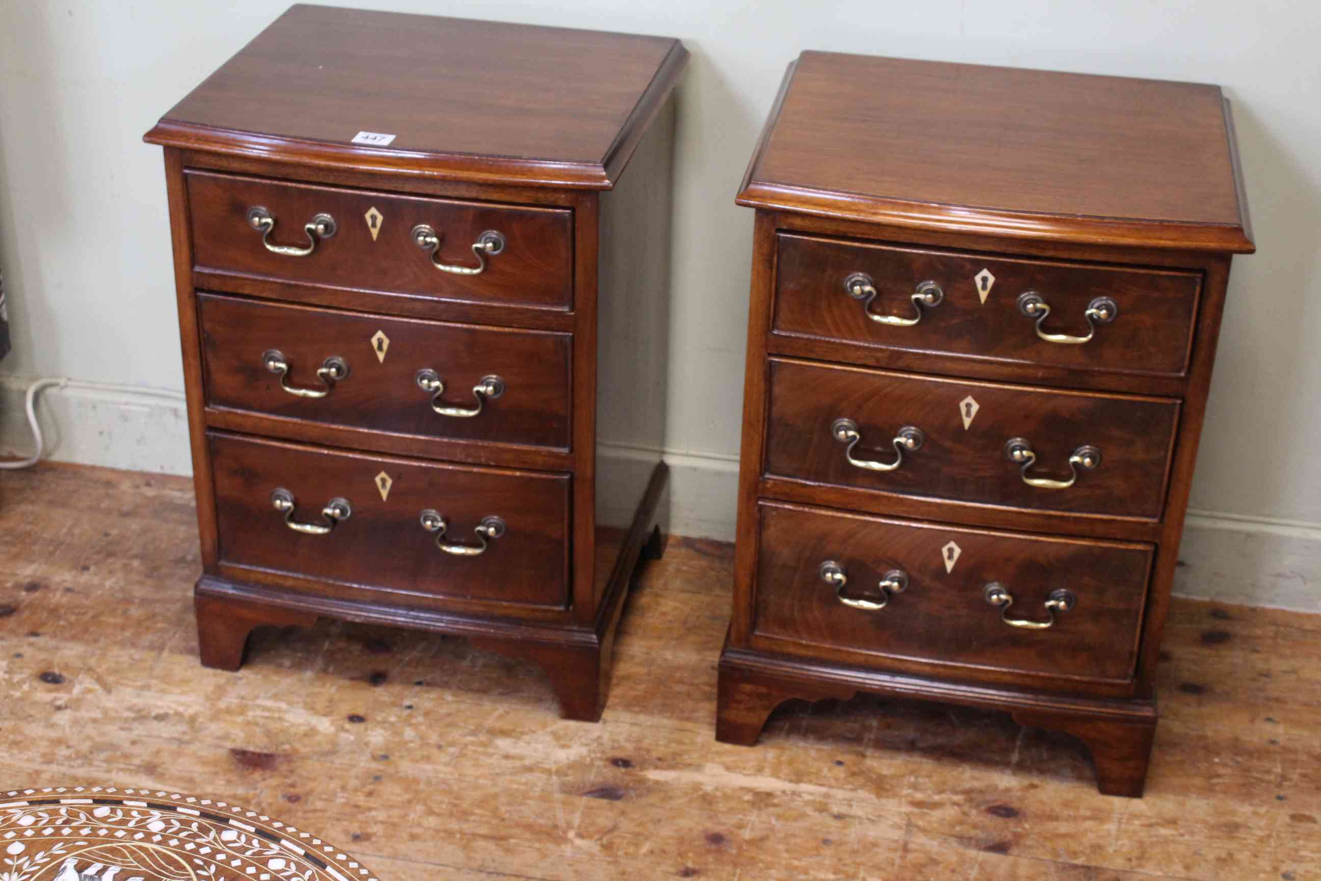 Pair neat mahogany three drawer pedestal chests, 56cm by 41cm by 35cm.