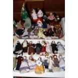 Collection of twenty eight Judith Cipkin costume dolls, and three musical boxes.