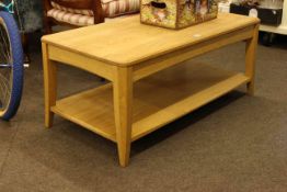 Ercol Artisan rectangular two tier coffee table, 43cm by 100.5cm by 50.5cm.