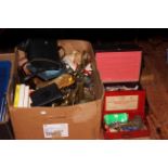 Box of metalwares, brass, binoculars, dominoes, coins, costume jewellery, etc.