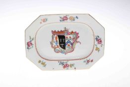 Chinese armorial dish of shaped rectangular form with arms and flower border, 27cm wide.