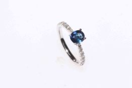 18 carat white gold sapphire and diamond ring, size K.