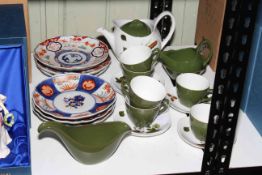 Six Imari plates and Midwinter tea service.