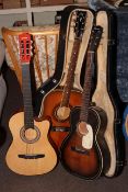 Three guitars including Hartwood Villanelle, Garanzia E.Ros Dakota, in case and another.