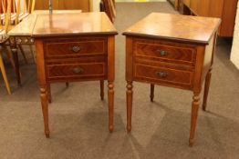 Pair Continental two drawer pedestals on turned reeded tapering legs,