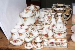 Collection of Royal Albert Country Roses pieces including two telephones, planters, vases,