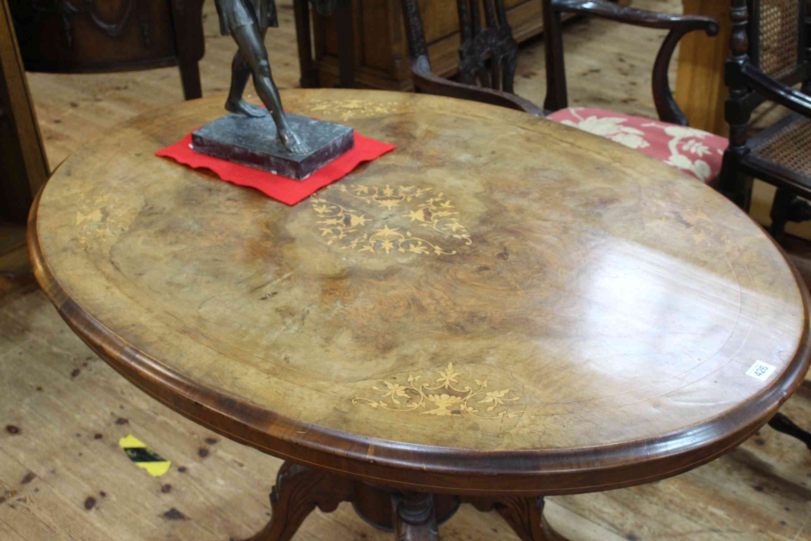 Victorian walnut and satinwood inlaid oval breakfast table raised on four turned supports to four - Image 2 of 2