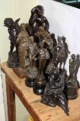 Collection of nine spelter and metal figures and carved wood figure (10).