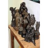 Collection of nine spelter and metal figures and carved wood figure (10).