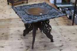 Oriental relief carved foliate and leaf occasional table with octagonal centre,