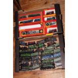 Two boxes of model railway steam locomotives, some with tenders.