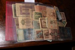 Two albums of A-Z worldwide banknotes including Austria, Belize,