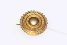 Victorian gold die-stamped locket brooch, 28mm diameter.