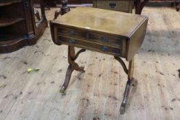Bevan Funnell Ltd Reprodux mahogany three drawer sofa table, 71cm by 67cm by 46cm (leaves down).