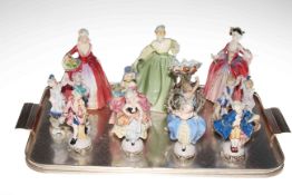 Collection of eleven figurines including three Royal Doulton.