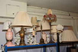 Collection of table lamps and a Cupid gold gilt standard lamp.