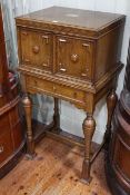 Oak cabinet canteen of cutlery having two panelled doors enclosing four drawers housing incomplete