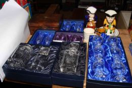 Collection of boxed crystal glassware including set of six brandy goblets, two toby jugs,