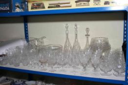 Collection of glasswares including decanters, long stemmed vases, jugs, etc.