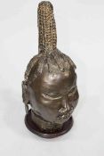 Studio pottery stoneware bronzed head of an African 'Benin' princess with wooden stand, 43cm high.