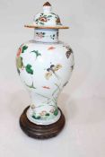 Antique Chinese famille verte baluster jar and cover, with butterfly, bird and foliage decoration,