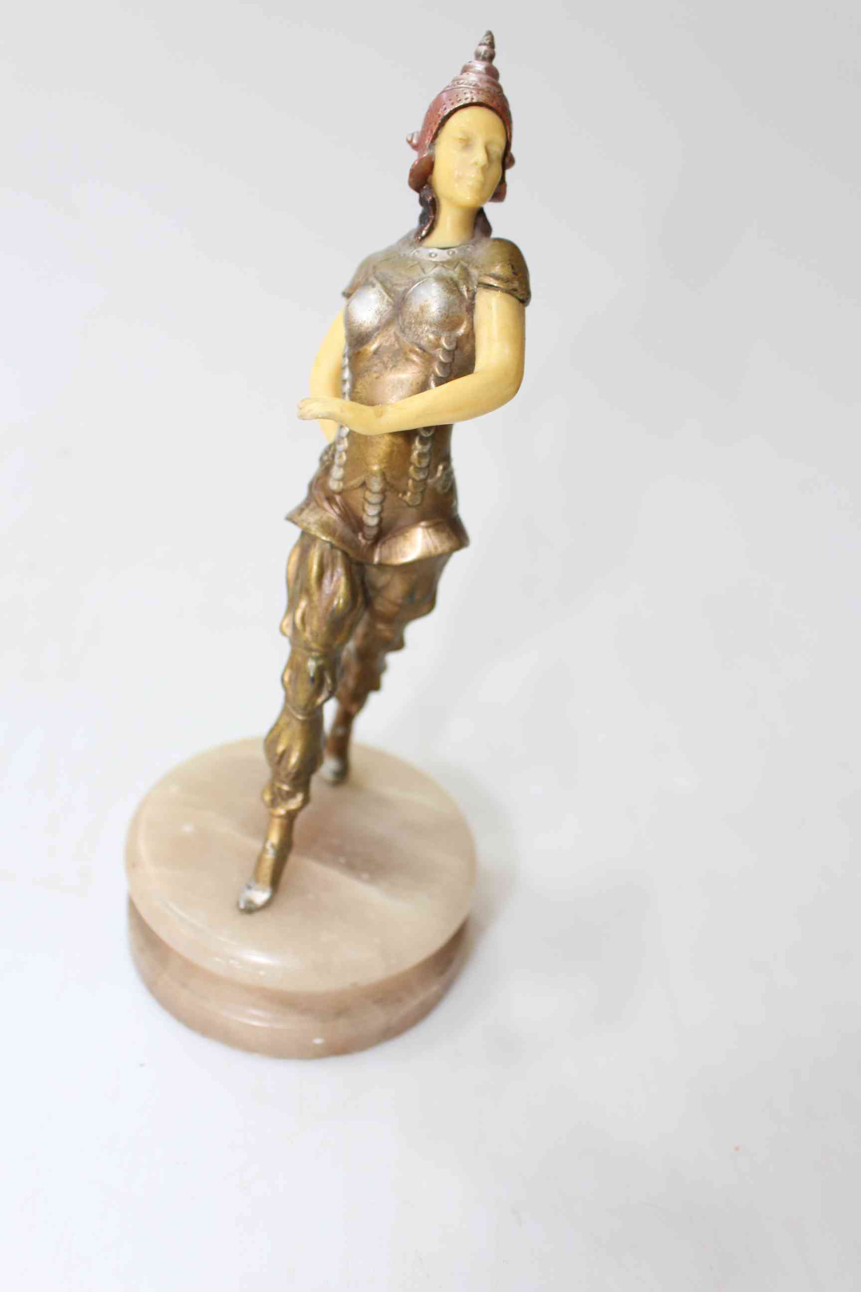 Art Deco coloured spelter figure of dancer in costume, 22cm.