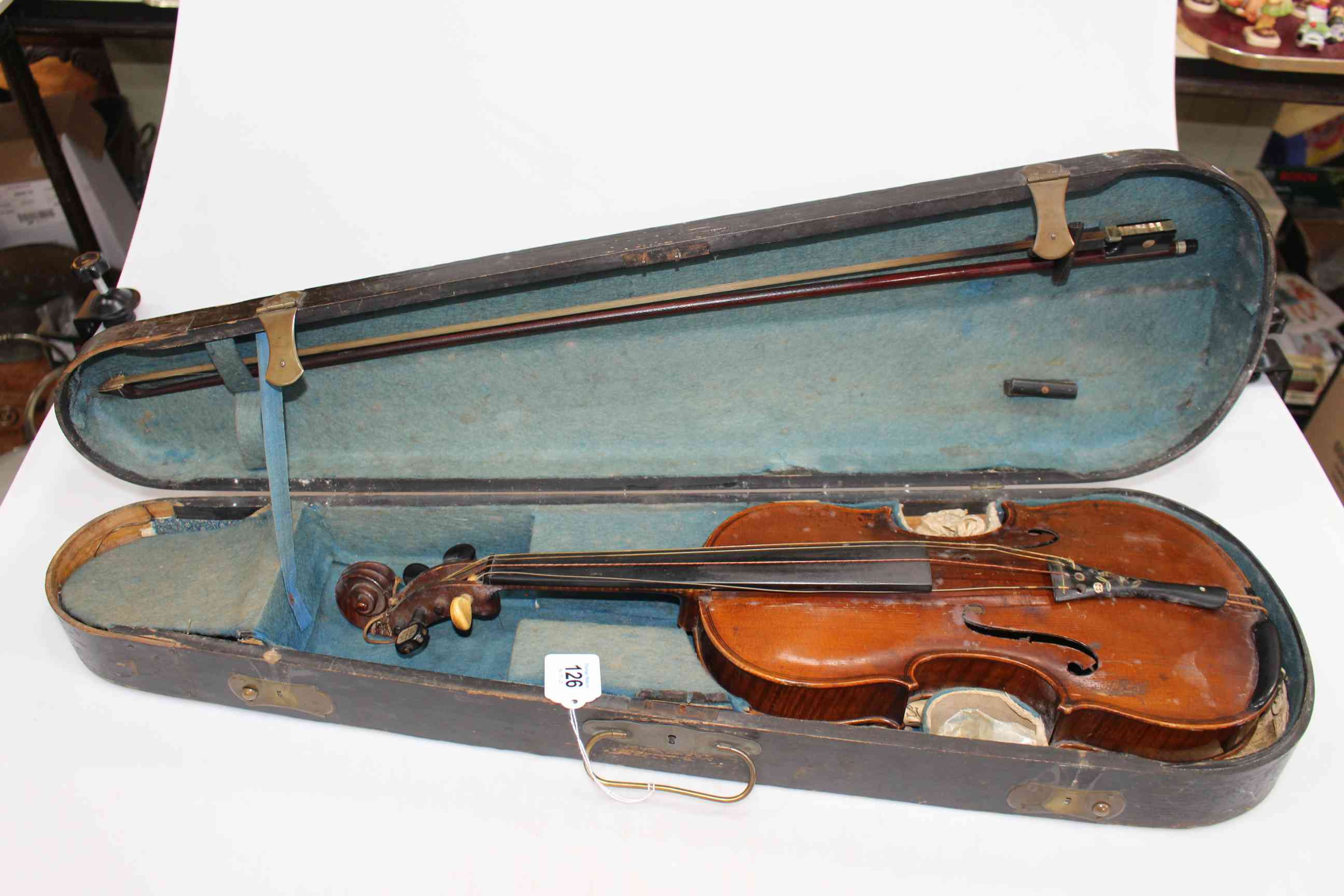 Violin and bow, cased, the violin bearing label Gustav Bernstein.