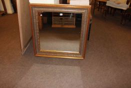 Gilt reeded framed wall mirror, 78cm by 78cm.