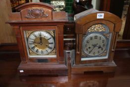 Two Edwardian bracket clocks, each with brass and silvered dials.