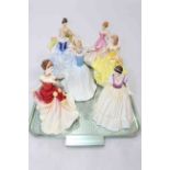 Collection of seven Royal Doulton figures including Pretty Ladies, Autumn Ball, Finishing Touch,