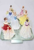 Collection of seven Royal Doulton figures including Pretty Ladies, Autumn Ball, Finishing Touch,