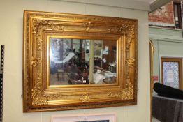 Good heavy gilt framed rectangular wall mirror, 127cm by 102cm.