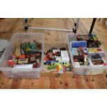 Three boxes of Diecast model vehicles, clockwork and tinplate toys, etc.