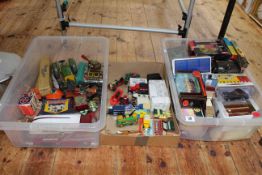 Three boxes of Diecast model vehicles, clockwork and tinplate toys, etc.