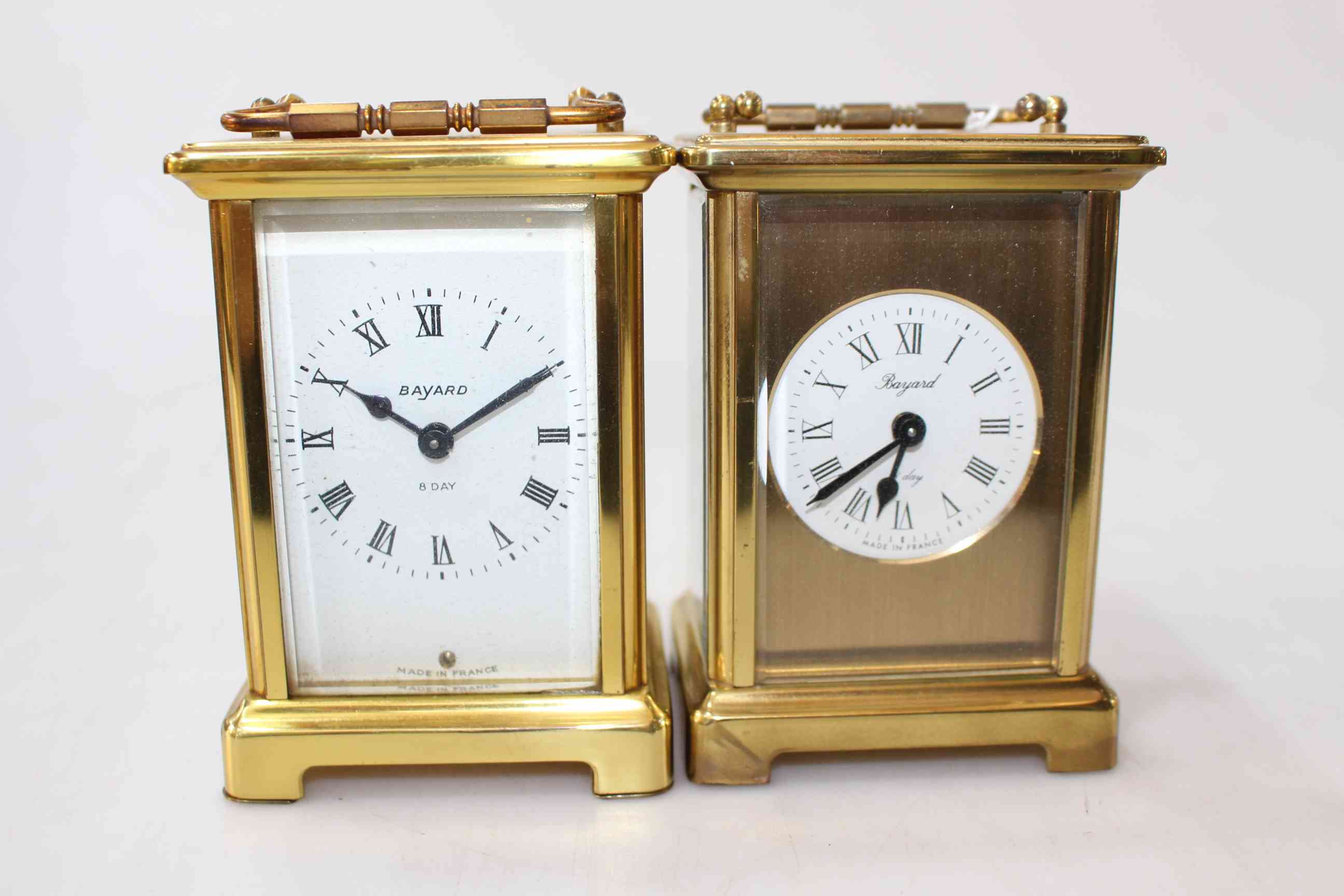 Two Bayard gilt carriage clocks.