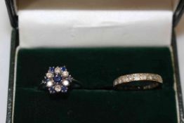 Sapphire and diamond cluster ring, size O, and 9 carat gold eternity ring (2).