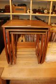 Teak nest of three tables (largest 51cm by 50cm by 50cm).