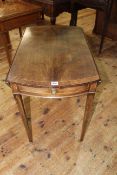 Mahogany and line inlaid Pembroke table having two opposing drawers and raised on square tapering