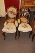 Set of three Victorian walnut balloon back parlour chairs and similar nursing chair.