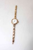 Ladies 9 carat gold wristwatch with expanding bracelet, possibly gold.