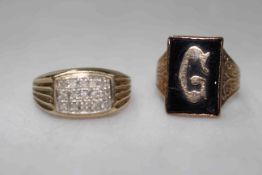 Two gents 9 carat gold rings, one with initial G, the other with 15 small diamonds.