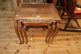 Burr walnut nest of three cabriole leg tables (largest 56cm by 59cm by 44cm).