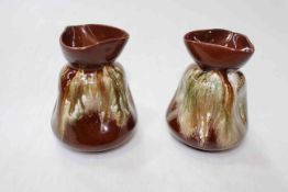 Pair Linthorpe Chr. Dresser vases, the dimpled bodies with streak glaze, 10.5cm.